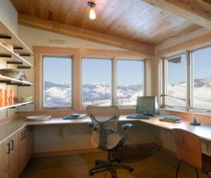Snow-covered-mountains-outside-the-window-give-this-home-office-a-spectacular-appeal-e1613757040518